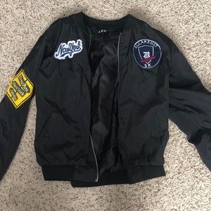 Black bomber jacket with patches